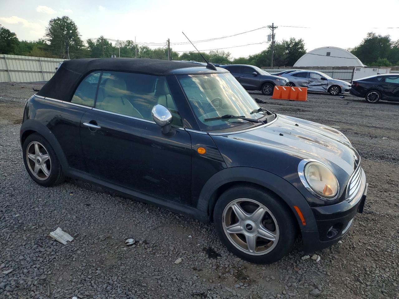 2010 Mini Cooper VIN WMWMR3C51ATZ19101 photo 4