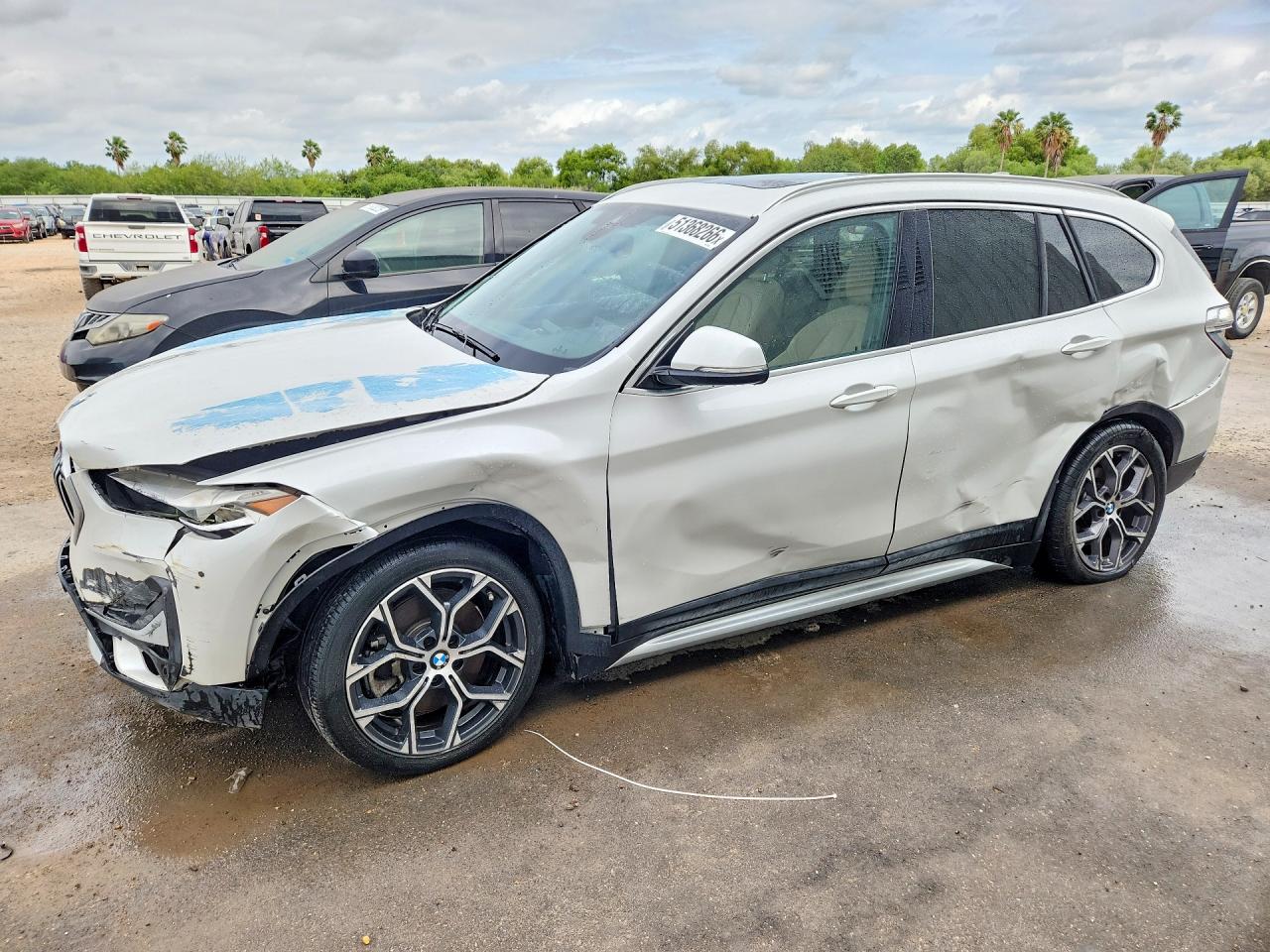 2020 BMW X1 VIN WBXJG7C01L5R93829 photo 1