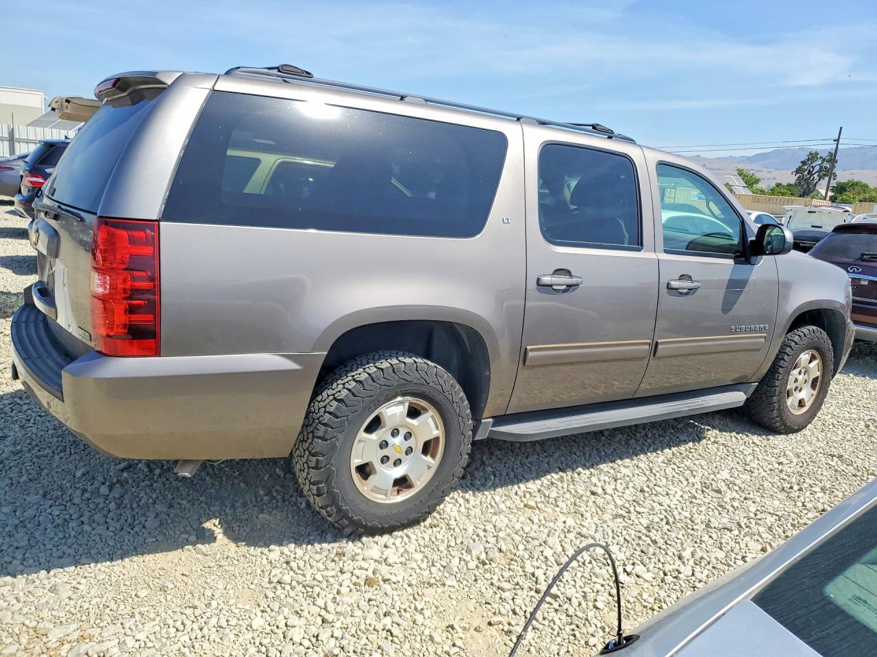 2012 Chevrolet Suburban VIN 1GNSKJE7XCR191707 photo 3