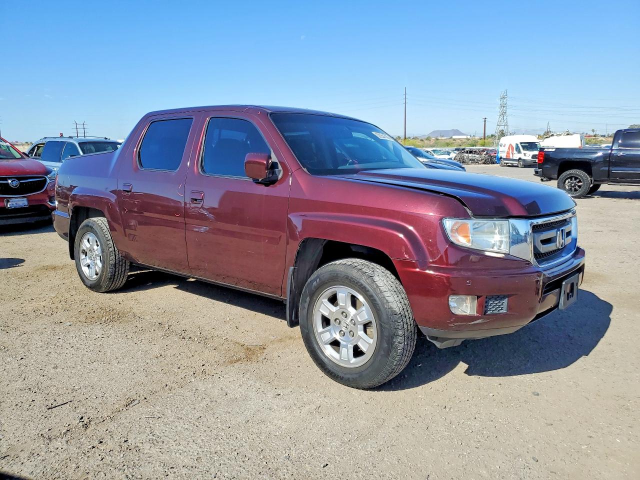 2011 Honda Ridgeline VIN 5FPYK1F41BB010965 photo 4