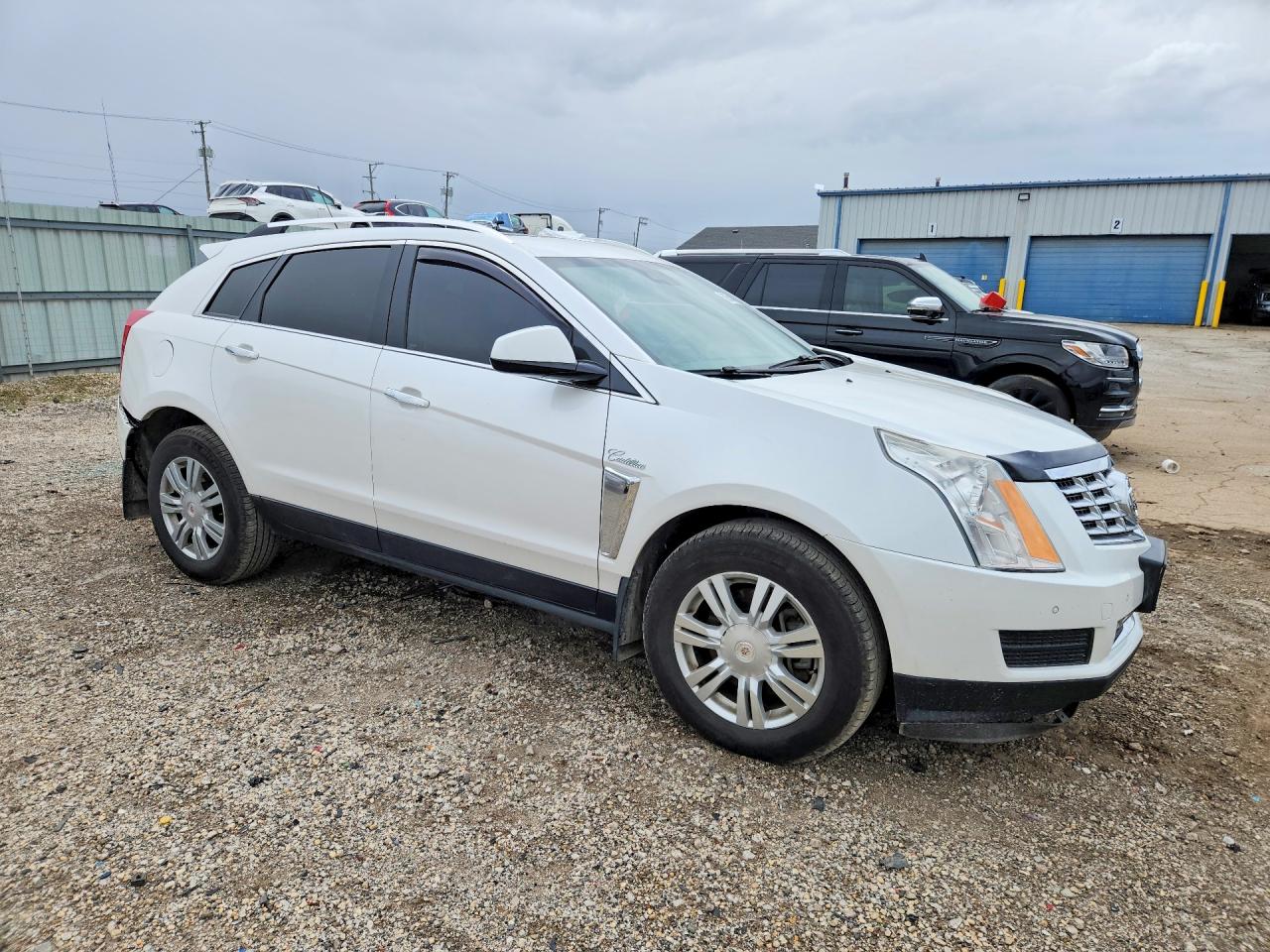2016 Cadillac Srx VIN 3GYFNBE31GS500627 photo 4