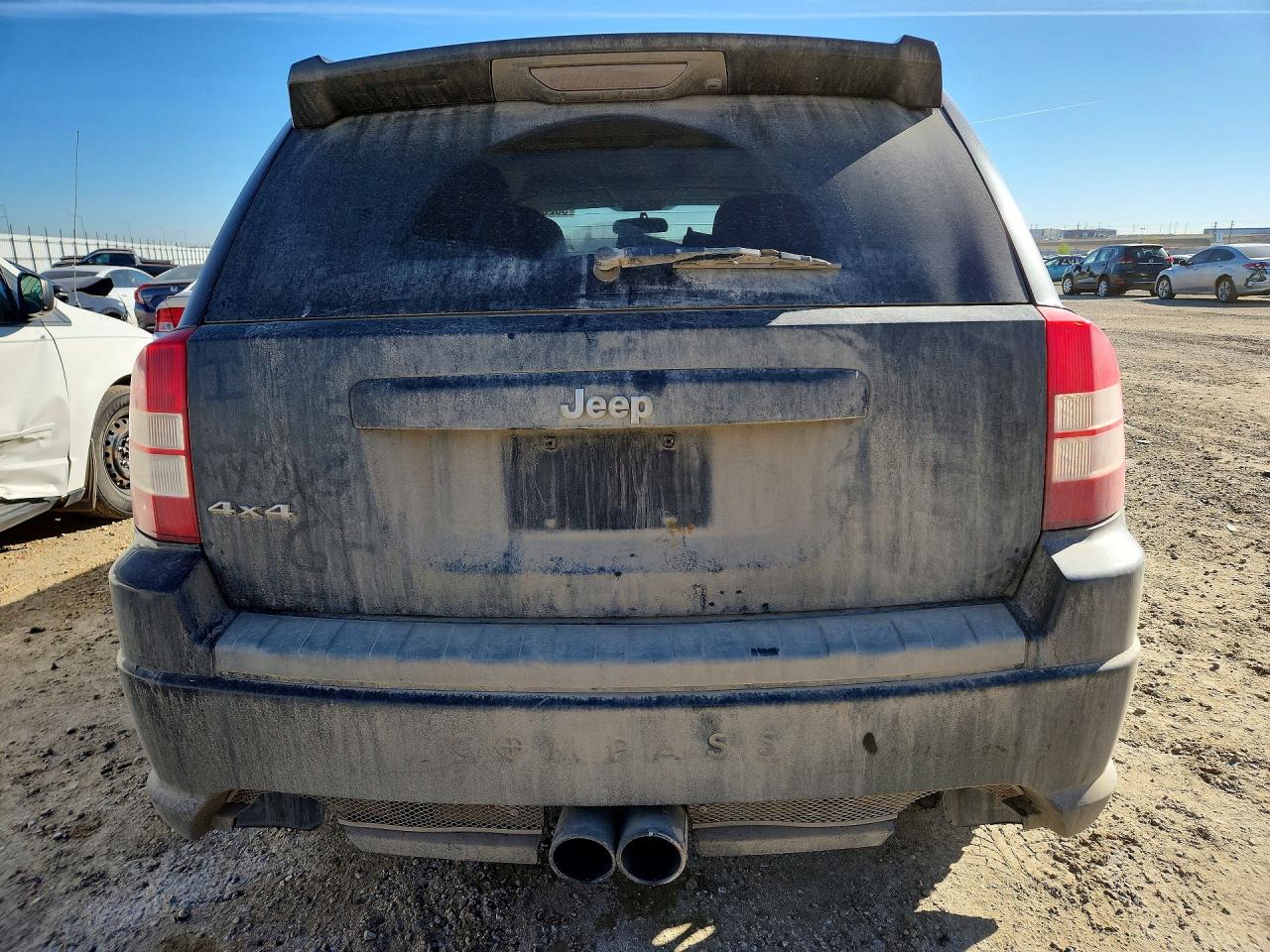 2009 Jeep Compass VIN 1J4FF47B59D105849 photo 6