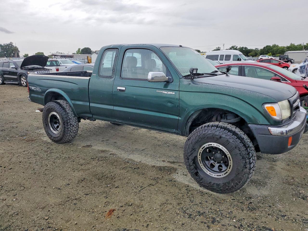 1999 Toyota Tacoma VIN 4TAWN74N1XZ560525 photo 4