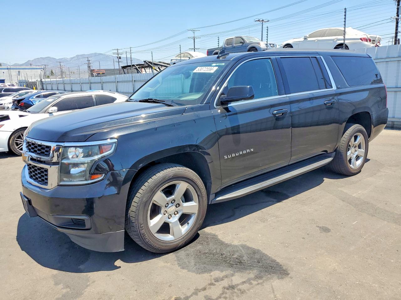 2020 Chevrolet Suburban VIN 1GNSCHKC9LR160620 photo 1