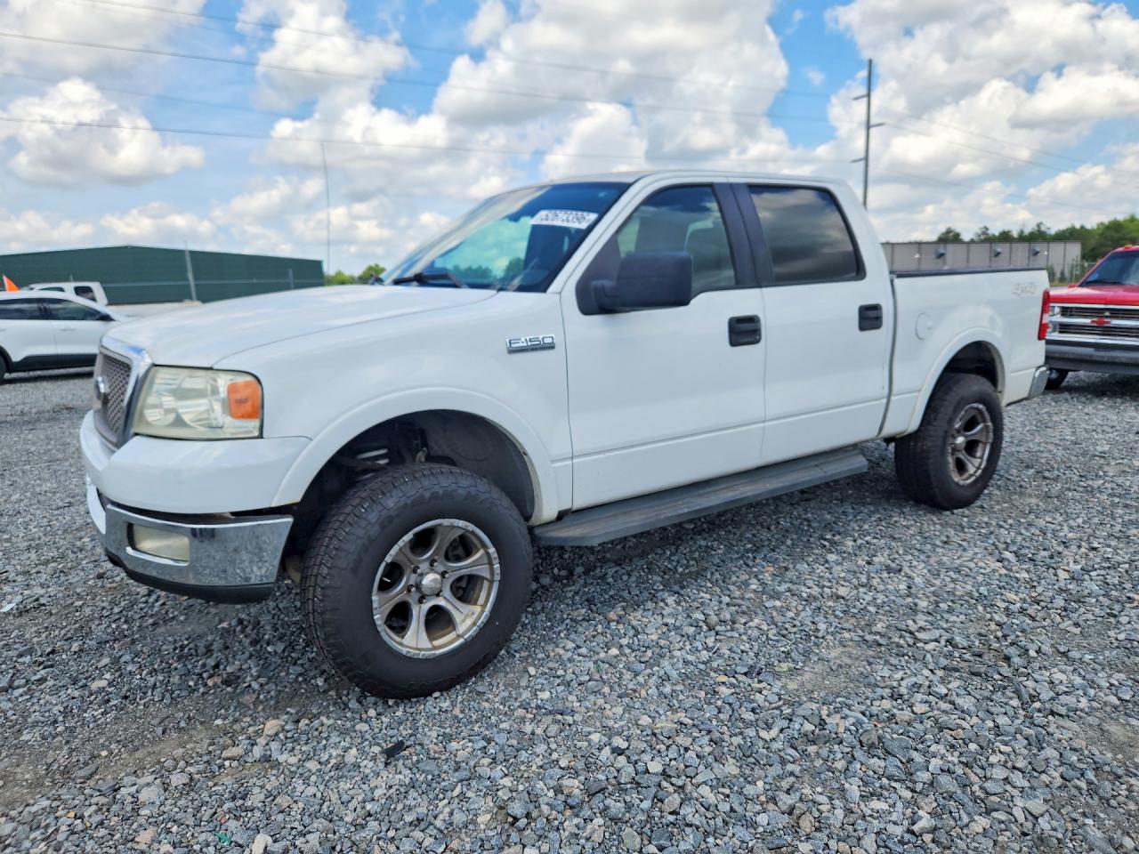 2005 Ford F150 VIN 1FTPW14575KC61887 photo 1