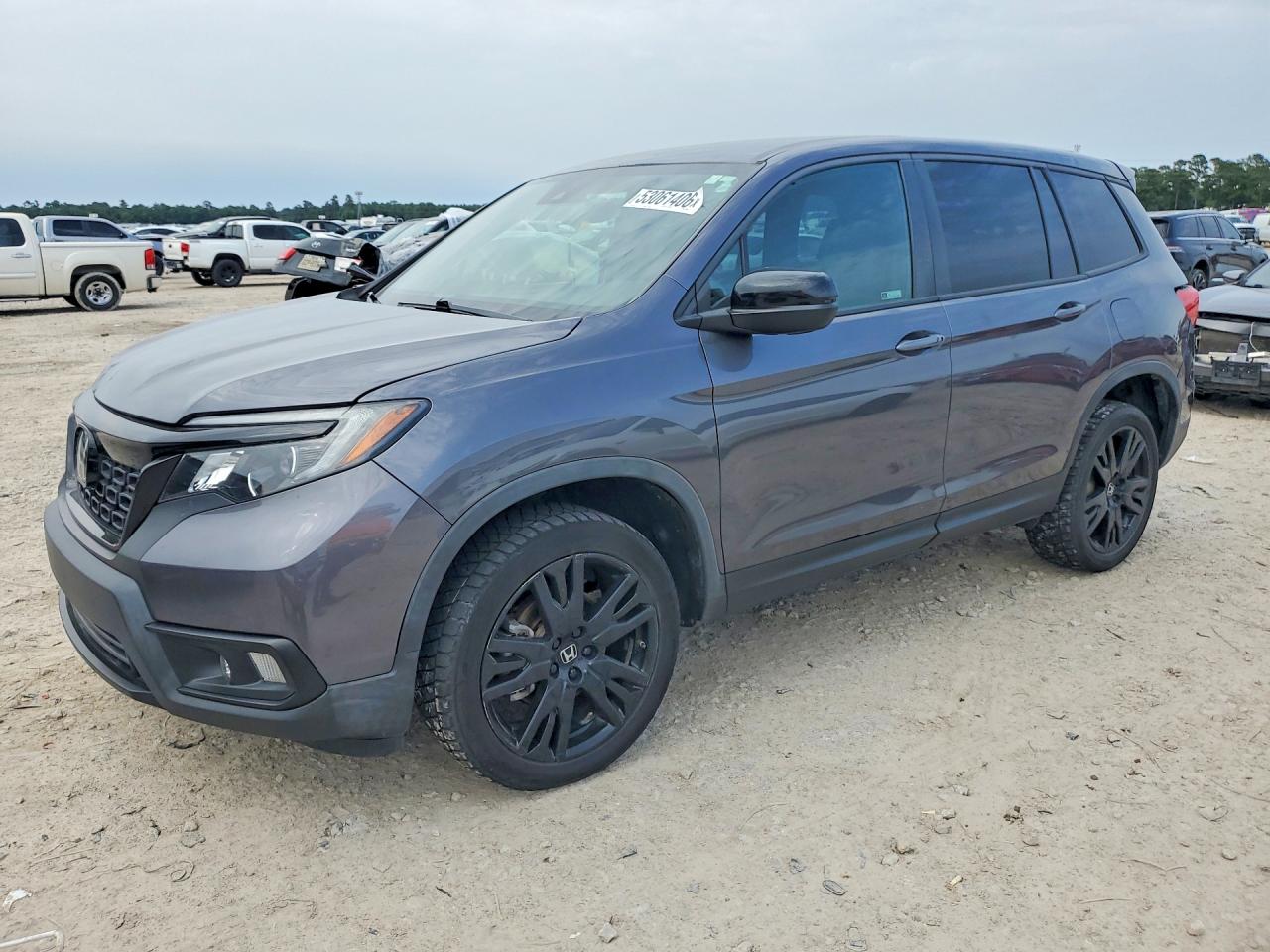 2021 Honda Passport VIN 5FNYF8H21MB008007 photo 1