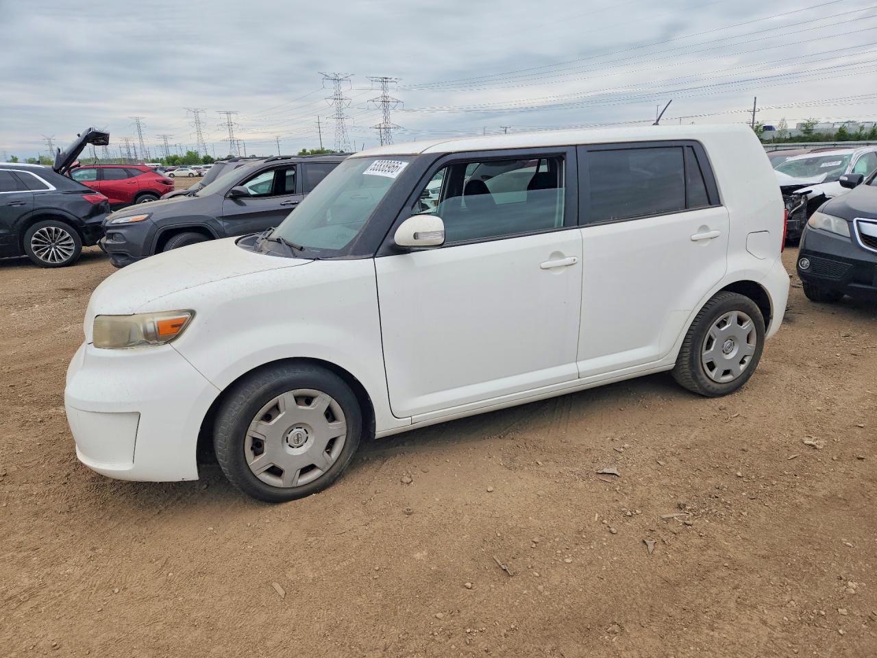 2009 Toyota Scion VIN JTLKE50E491088663 photo 1