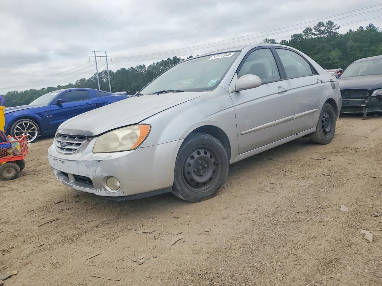 2005 Kia Spectra VIN KNAFE121X55167996 photo 1