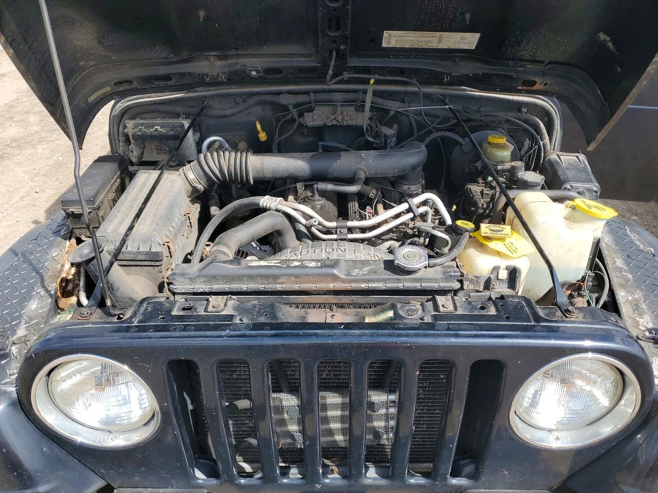 2002 Jeep Wrangler / VIN 1J4FA49S22P768280 photo 11