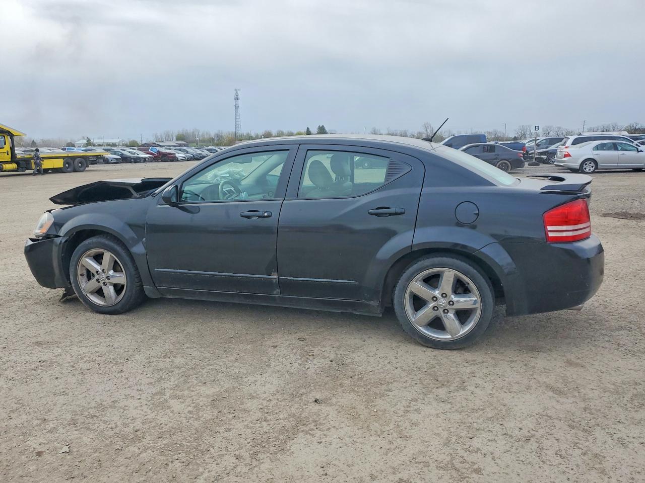 2009 Dodge Avenger VIN 1B3LC76V59N525542 photo 2