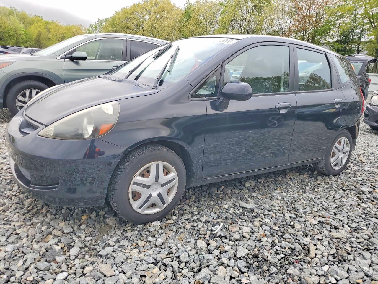 2008 Honda Fit VIN JHMGD37428S005082 photo 1