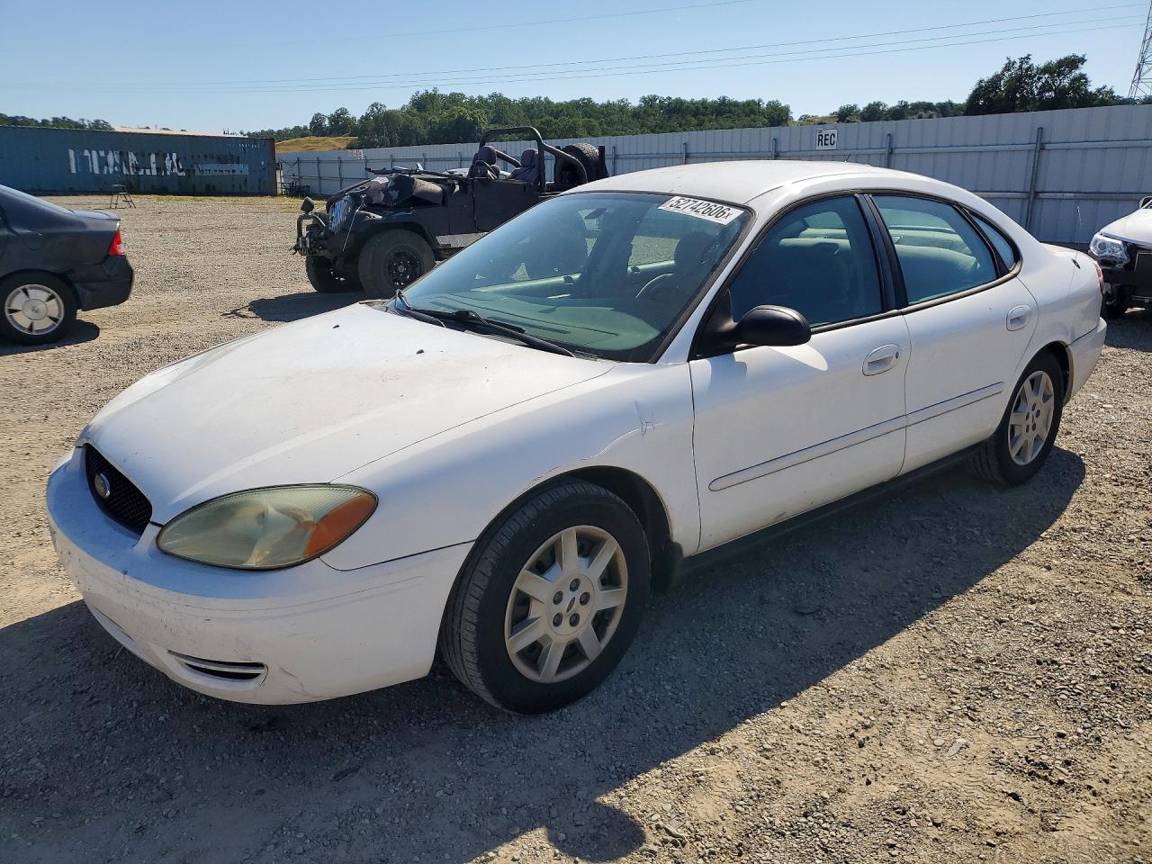2007 Ford Taurus VIN 1FAFP53U77A187751 photo 1
