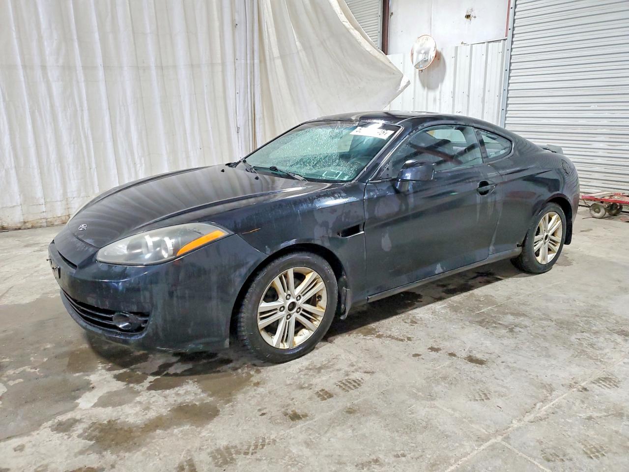2008 HYUNDAI Tiburon VIN KMHHM66D68U293276 photo 1