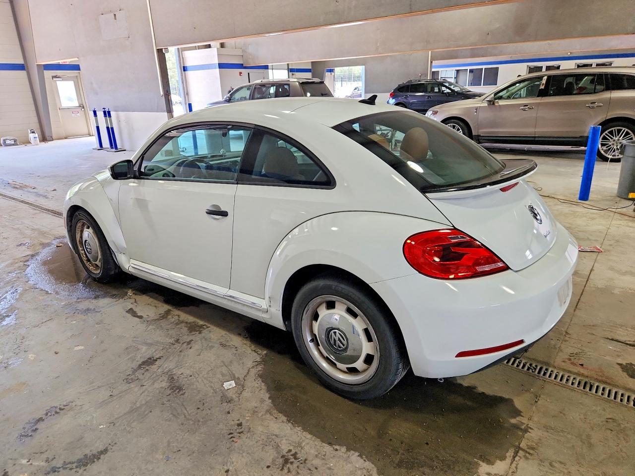 2016 Volkswagen Beetle VIN 3VWF17ATXGM637104 photo 2