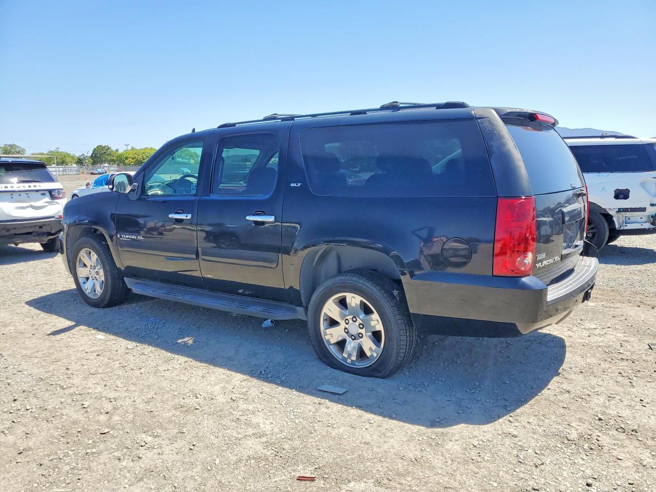 2007 GMC Yukon VIN 1GKFC16087R243399 photo 2