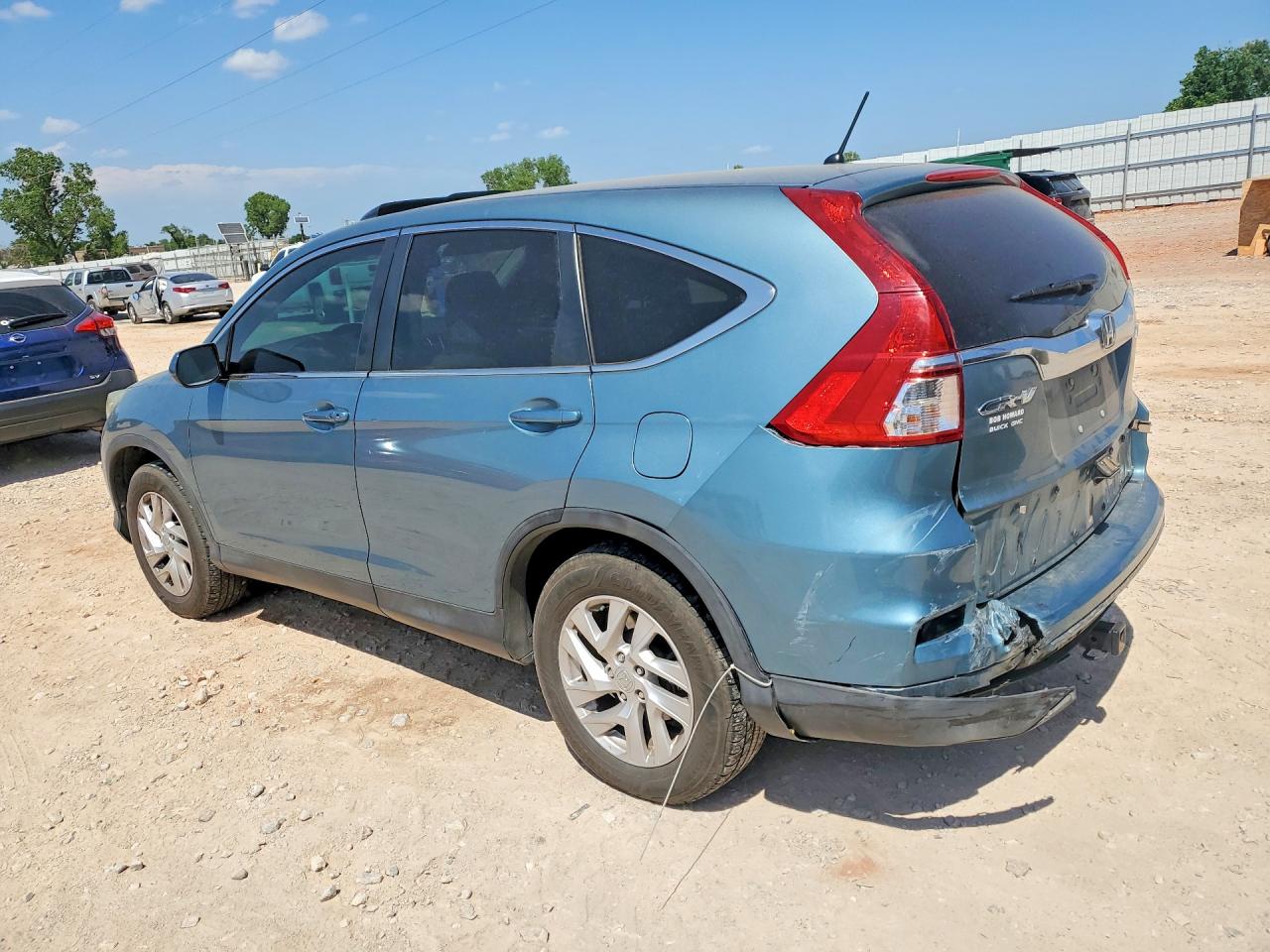2015 HONDA Crv VIN 2HKRM4H5XFH665003 photo 2
