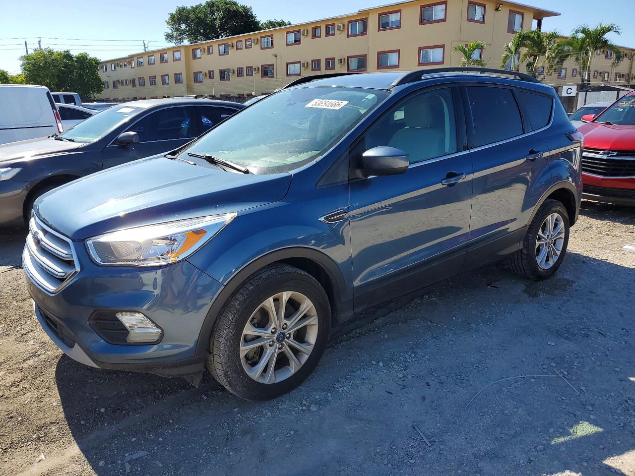 2018 Ford Escape VIN 1FMCU9GD7JUC79127 photo 1