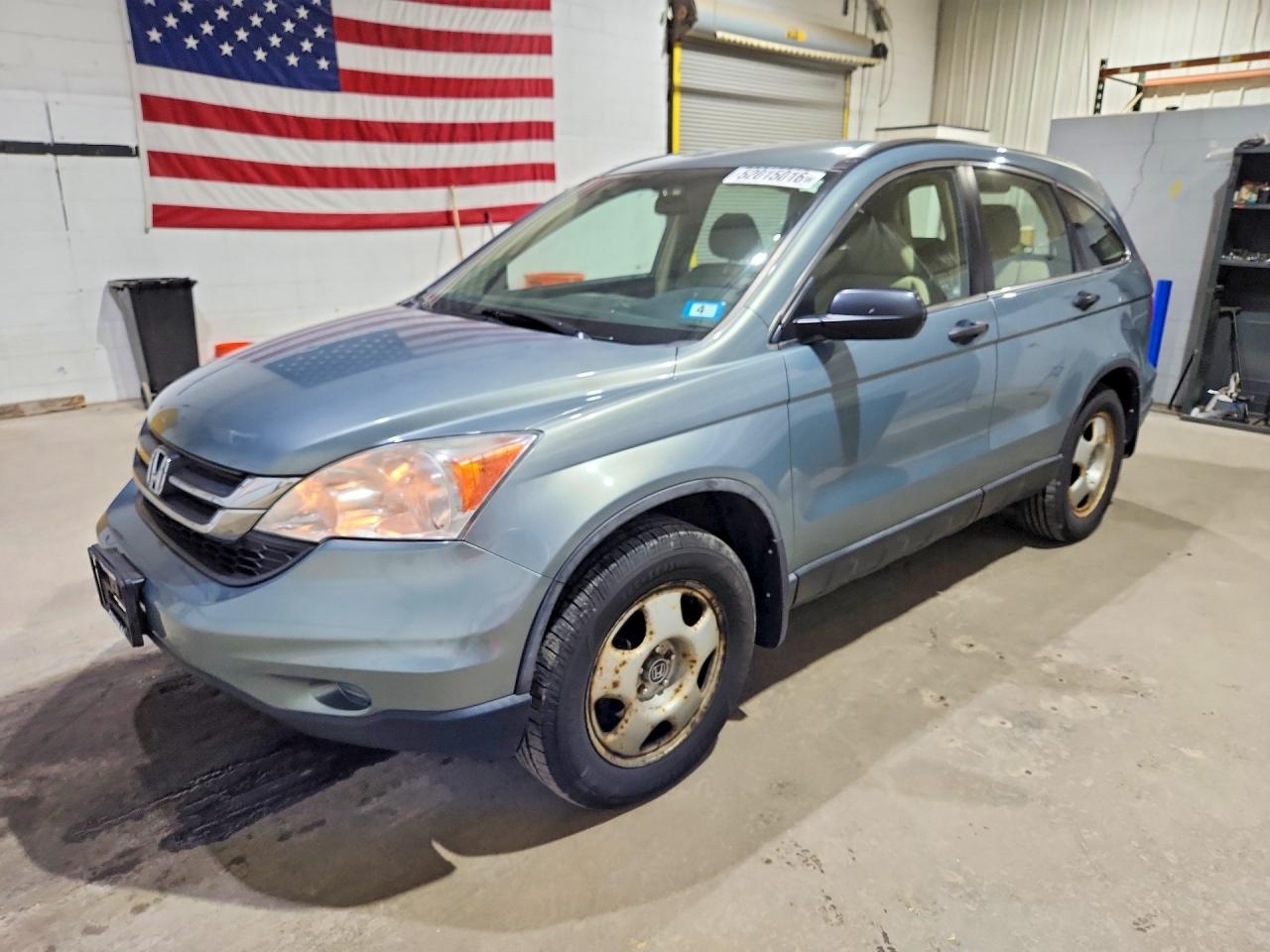 2011 Honda Crv VIN 5J6RE4H30BL060127 photo 1