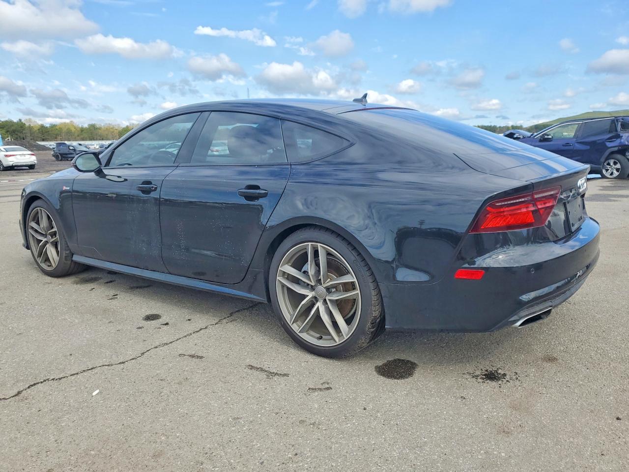 2016 Audi A7 VIN WAUWGAFC7GN078931 photo 2