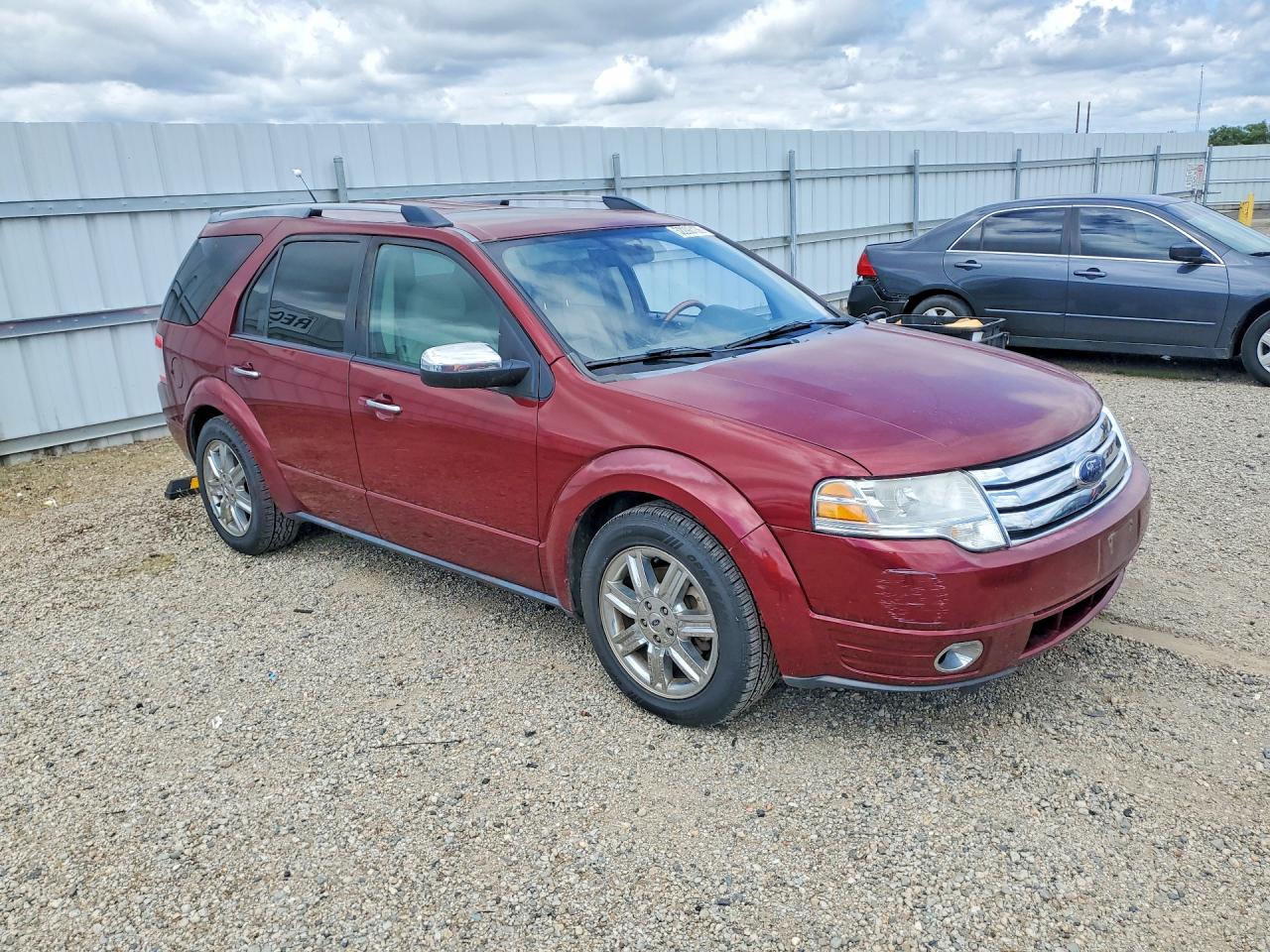 2008 Ford Taurus VIN 1FMDK06W18GA13328 photo 4