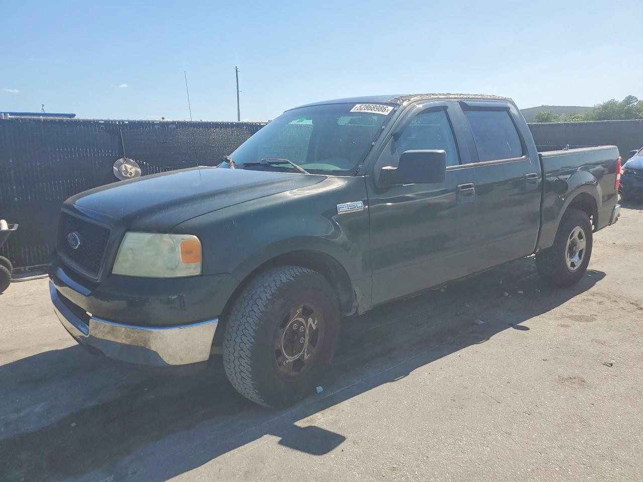 2005 Ford F150 VIN 1FTPW12555KD57925 photo 1