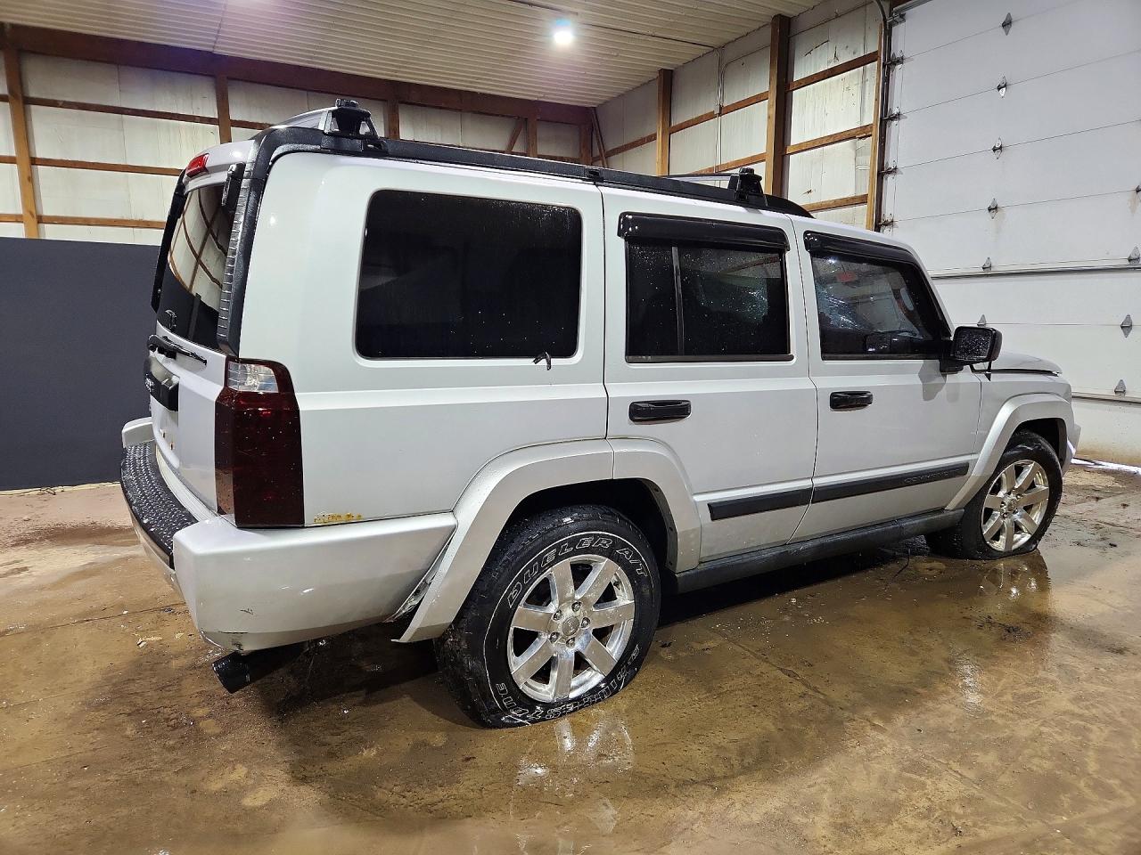 2006 Jeep Commander VIN 1J8HG48K76C162106 photo 3