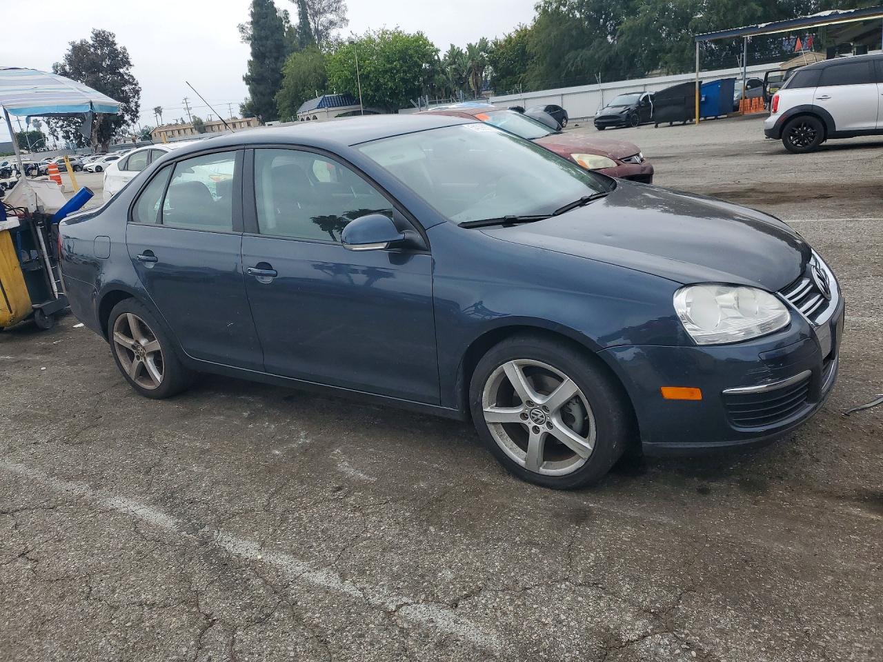 2009 Volkswagen Jetta VIN 3VWJZ71K19M089216 photo 4