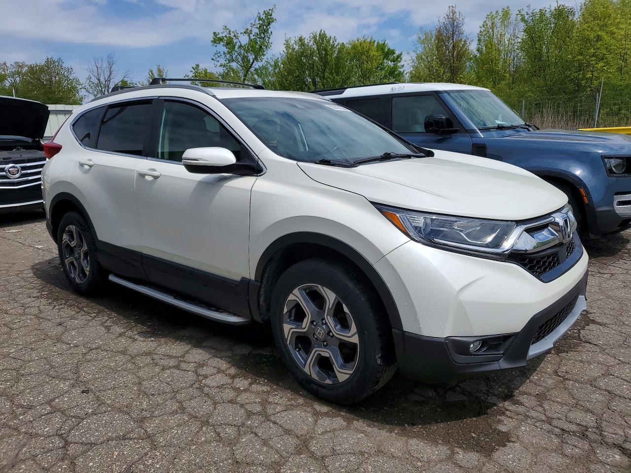 2018 Honda Crv VIN 2HKRW2H85JH665640 photo 4