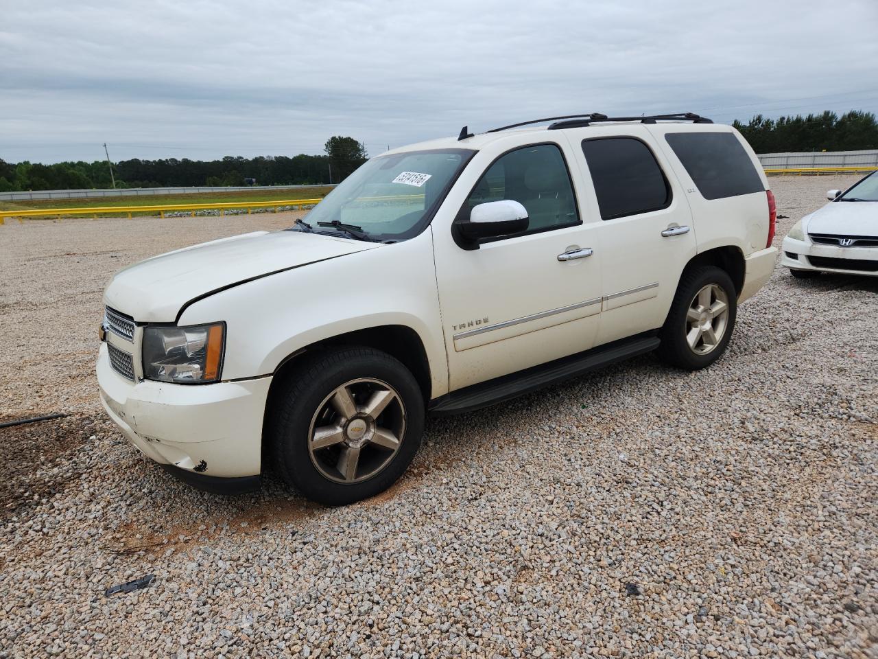 2014 Chevrolet Tahoe VIN 1GNSCCE05ER168544 photo 1
