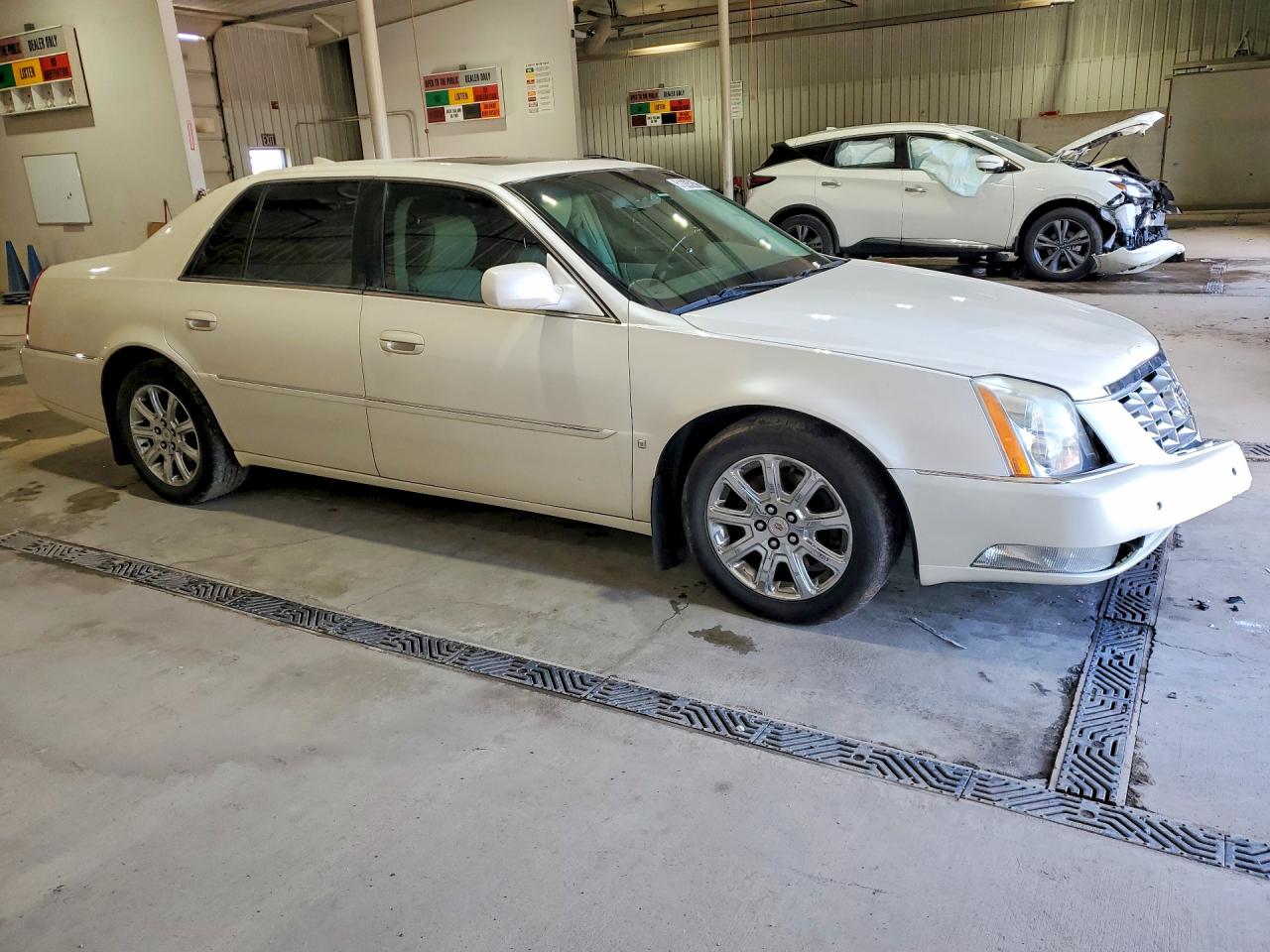2009 Cadillac Dts VIN 1G6KD57Y19U148527 photo 4