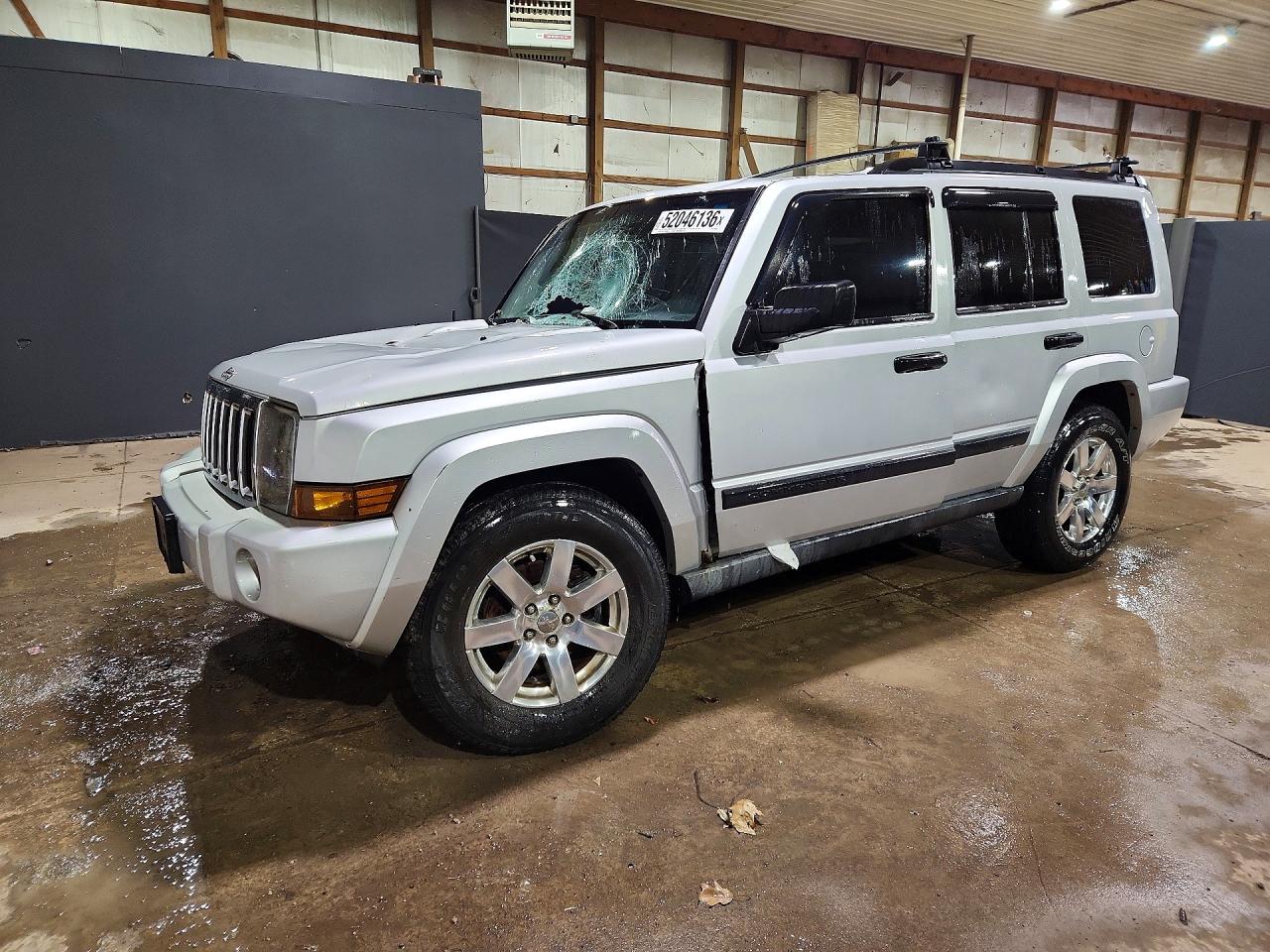 2006 Jeep Commander VIN 1J8HG48K76C162106 photo 1