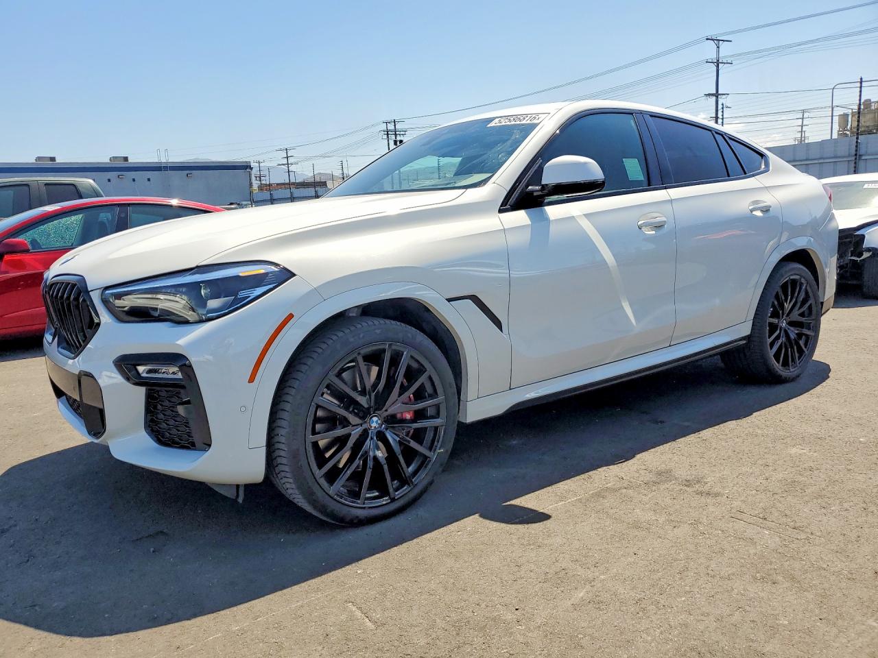 2021 BMW X6 VIN 5UXCY8C05M9G89617 photo 1