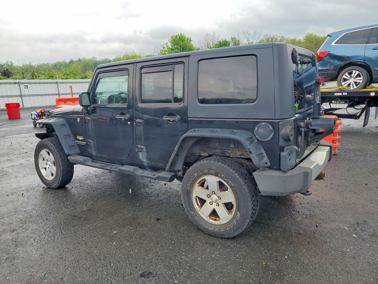 2010 Jeep Wrangler / VIN 1J4BA5H19AL162283 photo 2