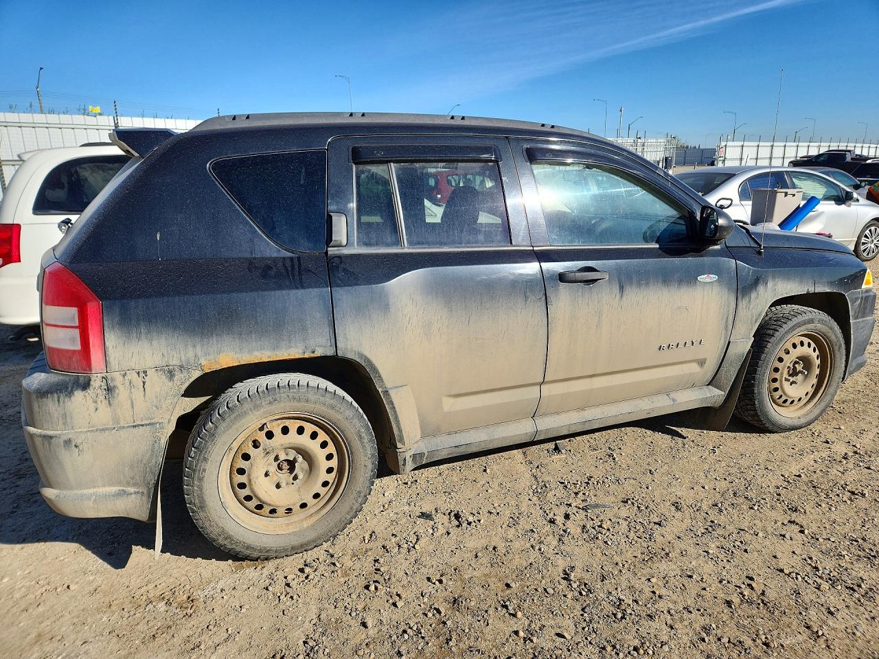 2009 Jeep Compass VIN 1J4FF47B59D105849 photo 3