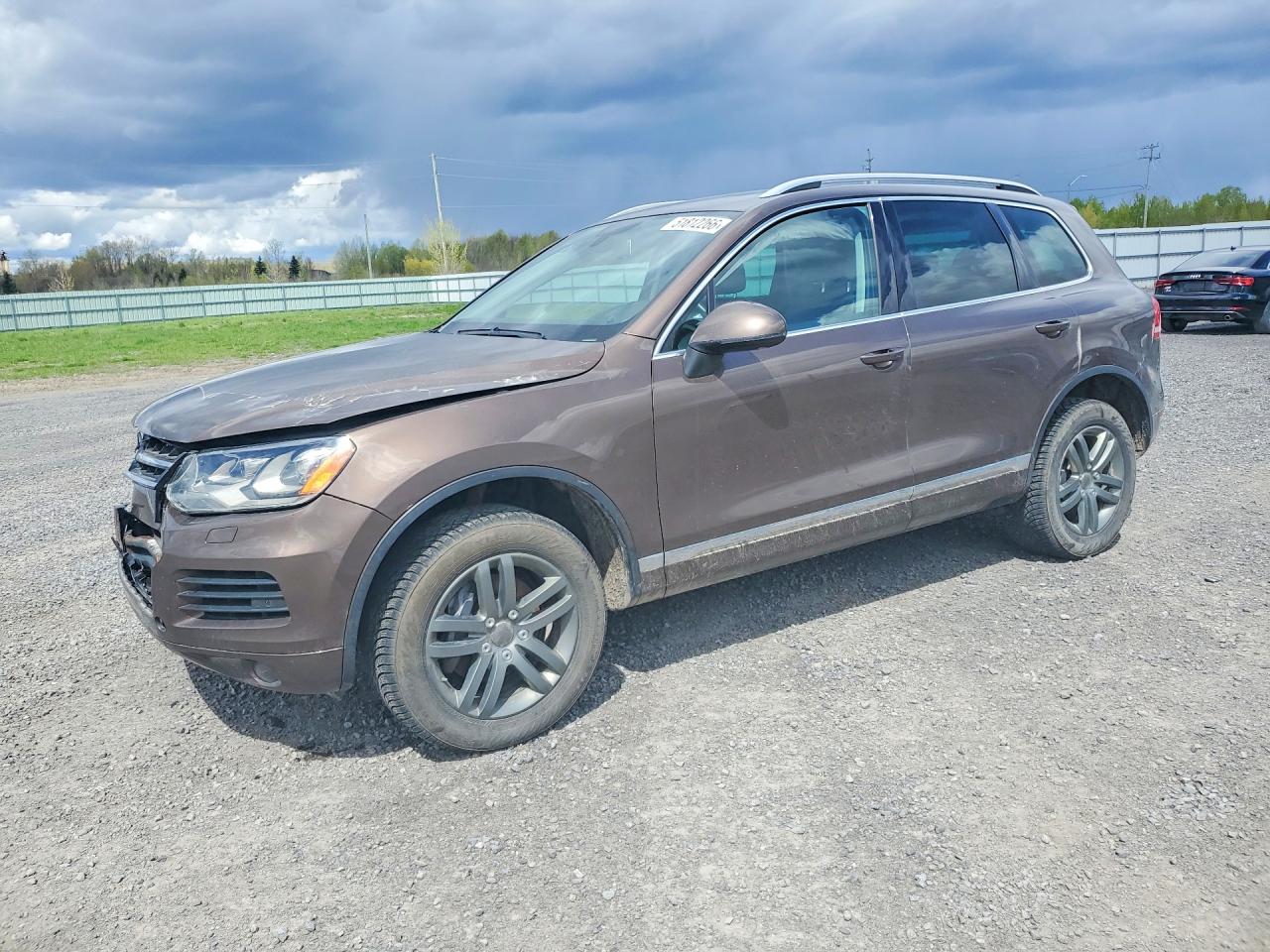 2014 Volkswagen Touareg VIN WVGEP9BP4ED011014 photo 1