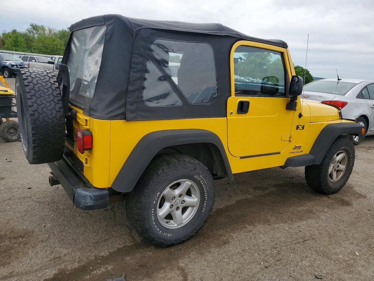 2004 Jeep Wrangler / VIN 1J4FA39S94P708574 photo 3