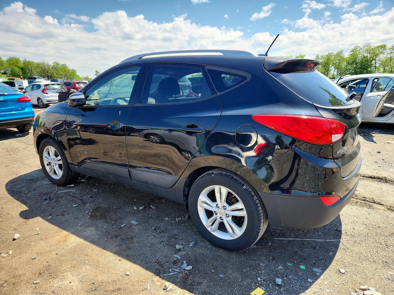 2013 Hyundai Tucson VIN KM8JU3AC3DU736606 photo 2