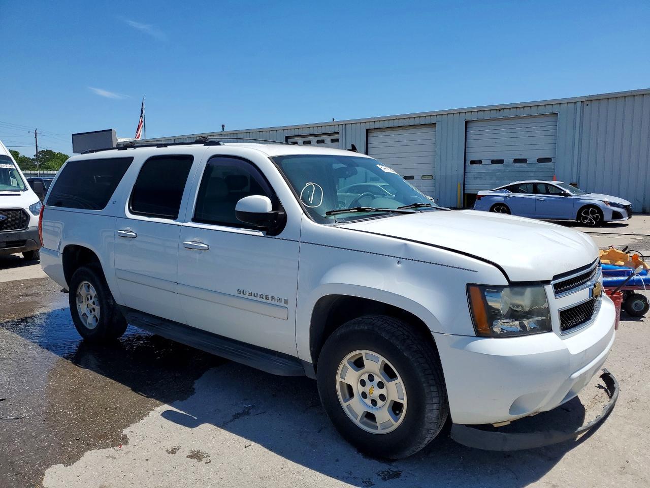 2009 CHEV Suburban VIN 1GNFK26329R216255 photo 4