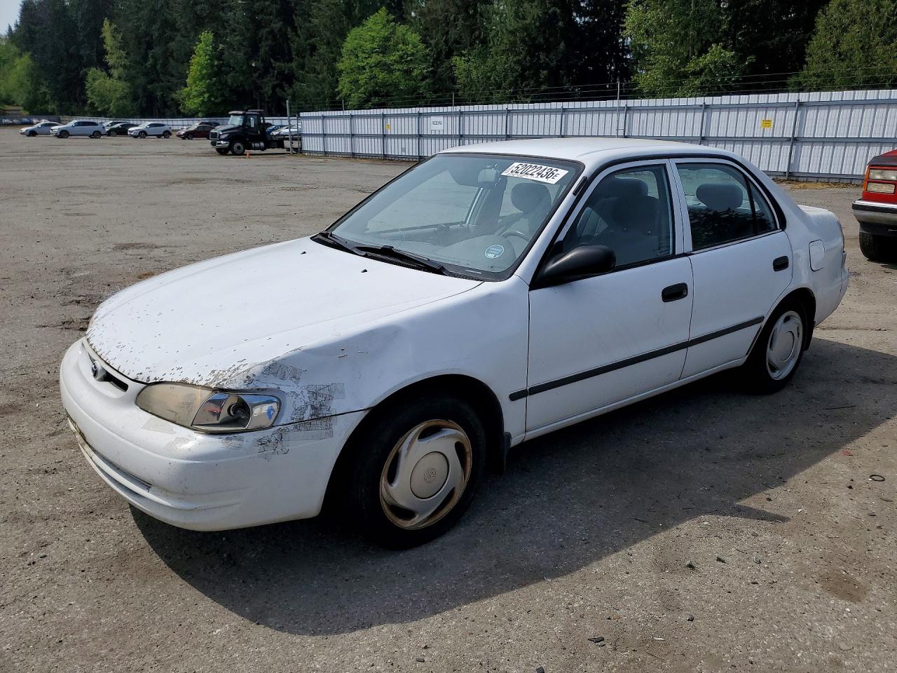2000 Toyota Corolla VIN 1NXBR12EXYZ391235 photo 1
