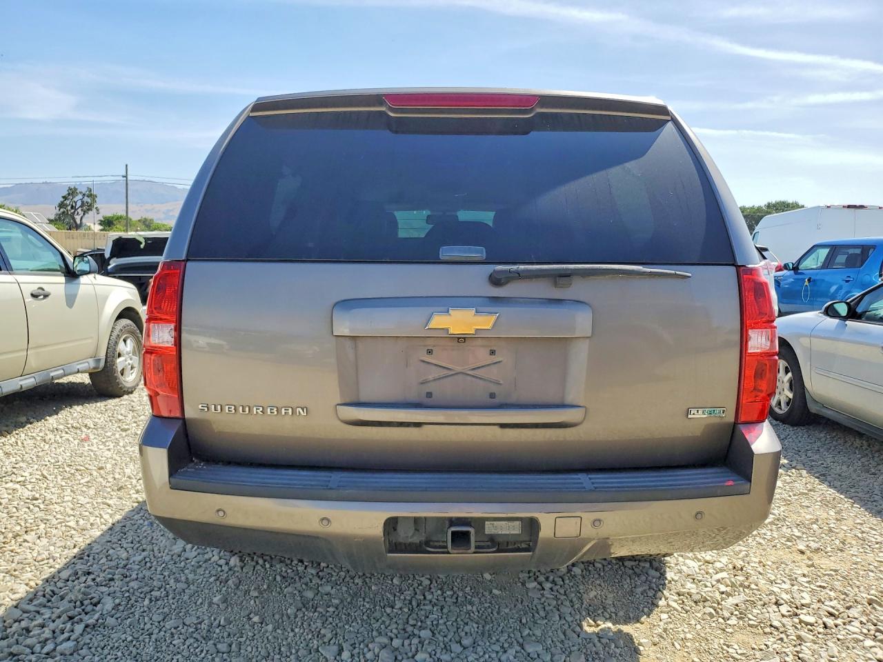 2012 Chevrolet Suburban VIN 1GNSKJE7XCR191707 photo 6