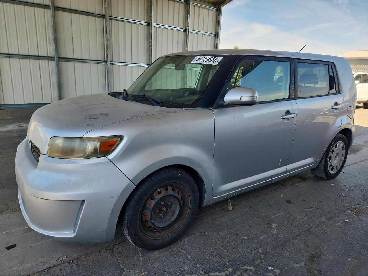 2009 Toyota Scion VIN JTLKE50E091069821 photo 1