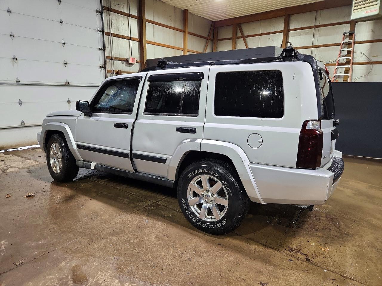 2006 Jeep Commander VIN 1J8HG48K76C162106 photo 2
