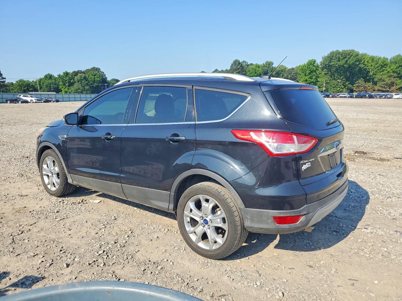 2015 Ford Escape VIN 1FMCU0JX4FUB61283 photo 2