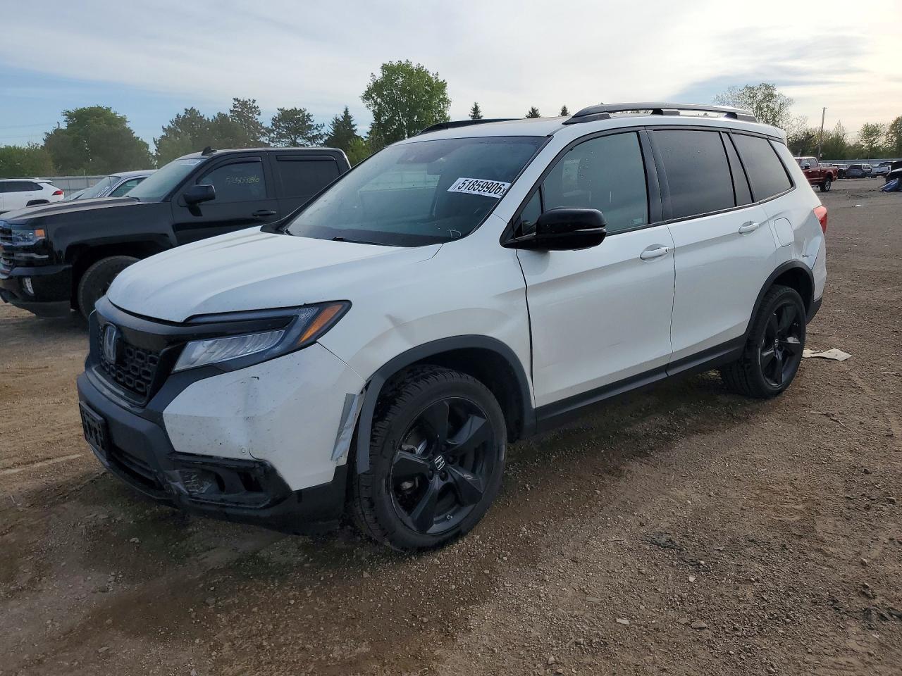 2021 Honda Passport VIN 5FNYF8H05MB028145 photo 1