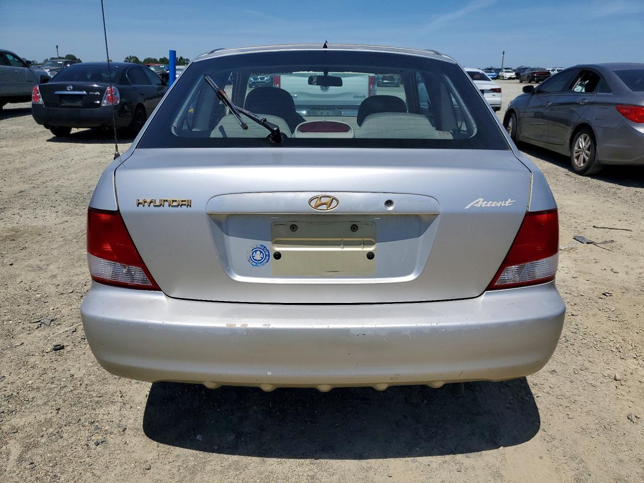 2000 Hyundai Accent VIN KMHCG35G2YU043819 photo 6