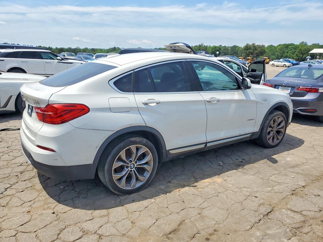 2018 BMW X4 VIN 5UXXW3C55J0Z60730 photo 3