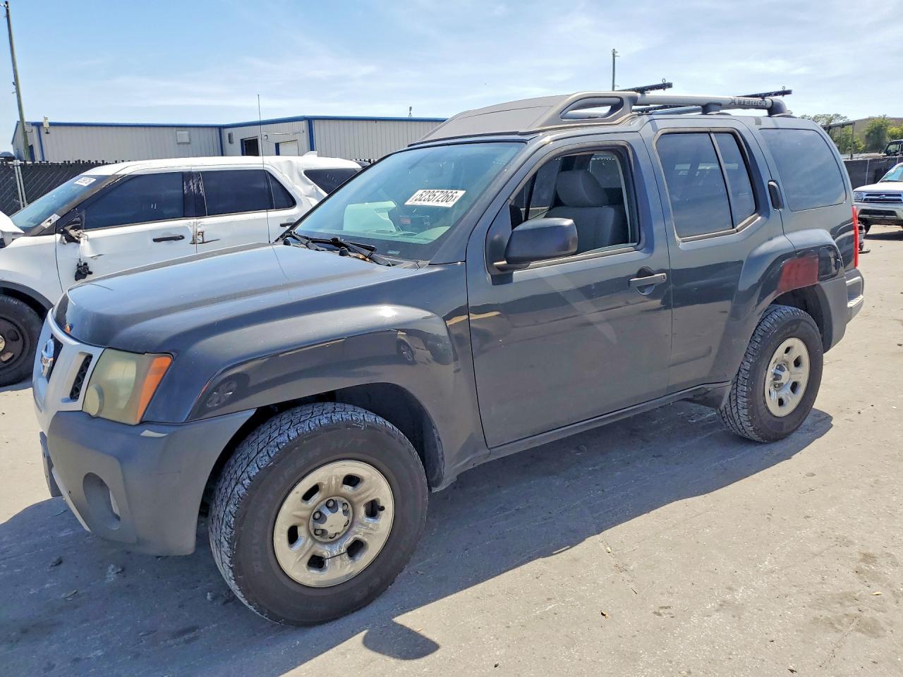 2010 Nissan Xterra VIN 5N1AN0NU5AC504623 photo 1