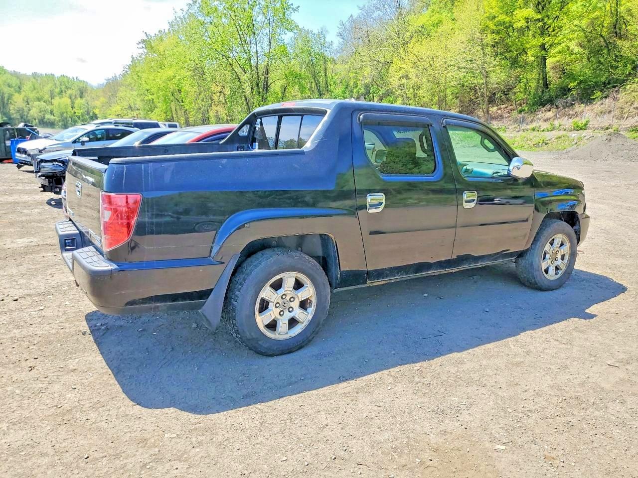 2011 Honda Ridgeline VIN 5FPYK1F48BB004242 photo 3