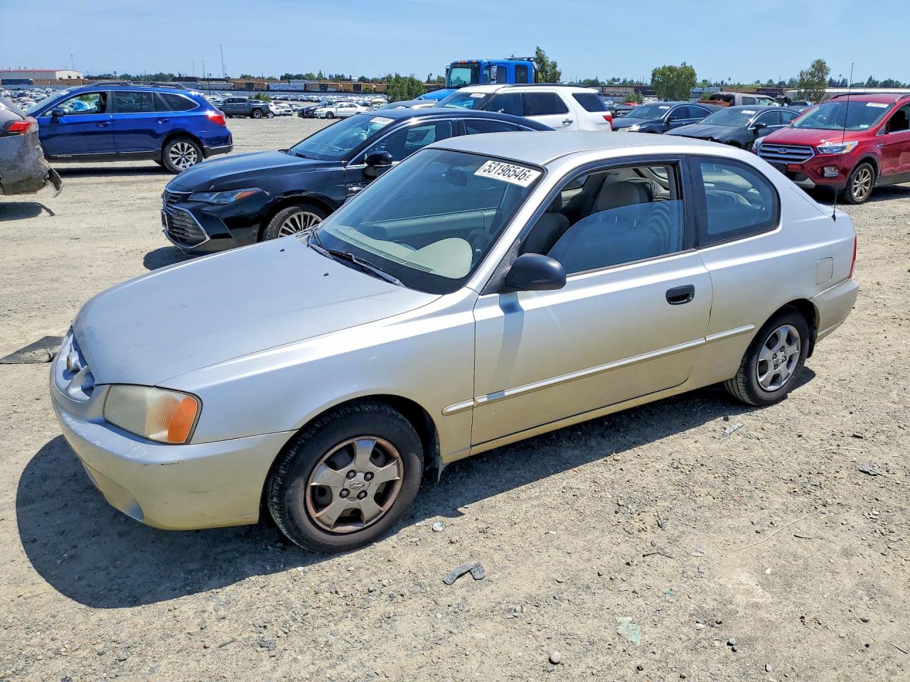 2000 Hyundai Accent VIN KMHCG35G2YU043819 photo 1