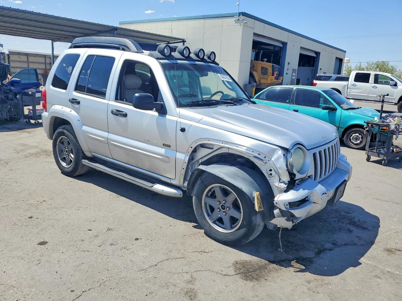 2003 Jeep Liberty VIN 1J4GL38K83W515479 photo 4